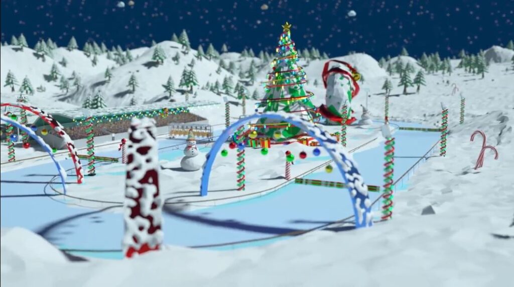 Snowy racetrack decorated with candy canes and Christmas lights, featuring a large Christmas tree, snowmen, and holiday-themed arches from the Reindeer Games team building event.